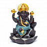 Stand for incense cones with flowing smoke of Ganesha on a lotus flower