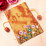 Orange brocade bag with embroidered flowers 9.6 x 14.2 cm