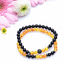 Set of two bracelets made of black agate and yellow-red beads