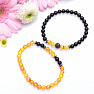 Set of two bracelets made of black agate and yellow-red beads