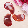 Gua sha made of red agate crescent shape