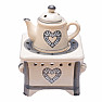 Aroma lamp ceramic Teapot on the stove with gray hearts