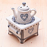 Aroma lamp ceramic Teapot on the stove with gray hearts