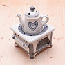 Aroma lamp ceramic Teapot on the stove with gray hearts