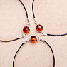 Fashionable string bracelet with an amber bead and Ag 925 silver