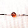 Fashionable string bracelet with an amber bead and Ag 925 silver