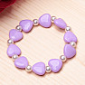 Children's bracelet made of purple hearts with pearls