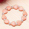 Children's bracelet made of salmon hearts with pearls