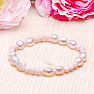 Women's pearl bracelet made of large pearls and cut glass