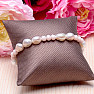 Women's pearl bracelet made of large pearls and cut glass