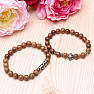 Set of bracelets made of wooden skull beads