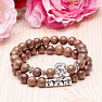 Set of bracelets made of wooden beads Lion