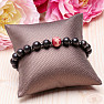 Bracelet with wooden beads with red bead