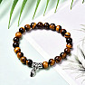 Bracelets for couples made of lava beads and tiger's eye