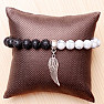 Howlit white and lava bracelet with angel wing