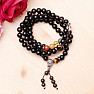 Wrap chakra bracelet made of black wooden beads in Tibetan style