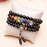 Wrap chakra bracelet made of black wooden beads in Tibetan style