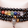 Wrap chakra bracelet made of black wooden beads in Tibetan style