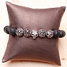 Lava stone bracelet in Tibetan style with skull