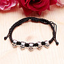 Bracelet with pull-down skulls, silver color