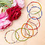 Set of 9 fashion bracelets made of glass beads