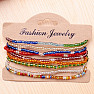 Set of 9 fashion bracelets made of glass beads