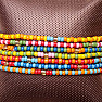 Set of 7 fashion bracelets made of colored glass beads