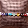 Chakra bracelet made of white pearls