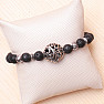 Lava stone bracelet with Tibetan style ornaments