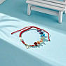 Macramé bracelet chakra red string