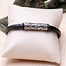 Men's black leather bracelet decorated with stainless steel