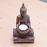 Buddha with a lotus-shaped stand for a tea candle