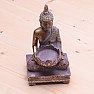 Buddha with a lotus-shaped stand for a tea candle