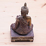 Buddha with a lotus-shaped stand for a tea candle