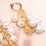 Fashion earrings with a bunch of mother of pearl pearls and citrines