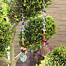 Flower of life Feng Shui window hanging made of colored crystals and gold metal