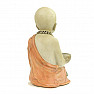 Buddhist monk figurine of a boy with a tea light stand hand-colored