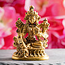 Feng Shui statuette of the goddess Green Tara on a brass lotus