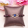 Garnet fashion bracelet with metal ornament