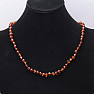 Polished baroque amber necklace in cognac color