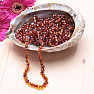 Polished baroque amber beads for children color cognac