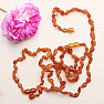 Flat amber beads for children, color cognac