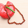 Round amber beads for children, color cognac