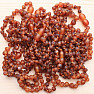 Round amber beads for children, color cognac