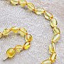 Amber necklace of polished lemon beans