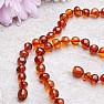 Amber necklace polished baroque in cognac color