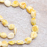 Amber natural necklace made of polished beads of butter color