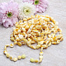 Amber natural necklace made of polished beads of butter color