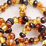 Natural amber bracelet with multicolor polished beads