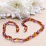 Amber beads for children baroque cognac color with amethyst